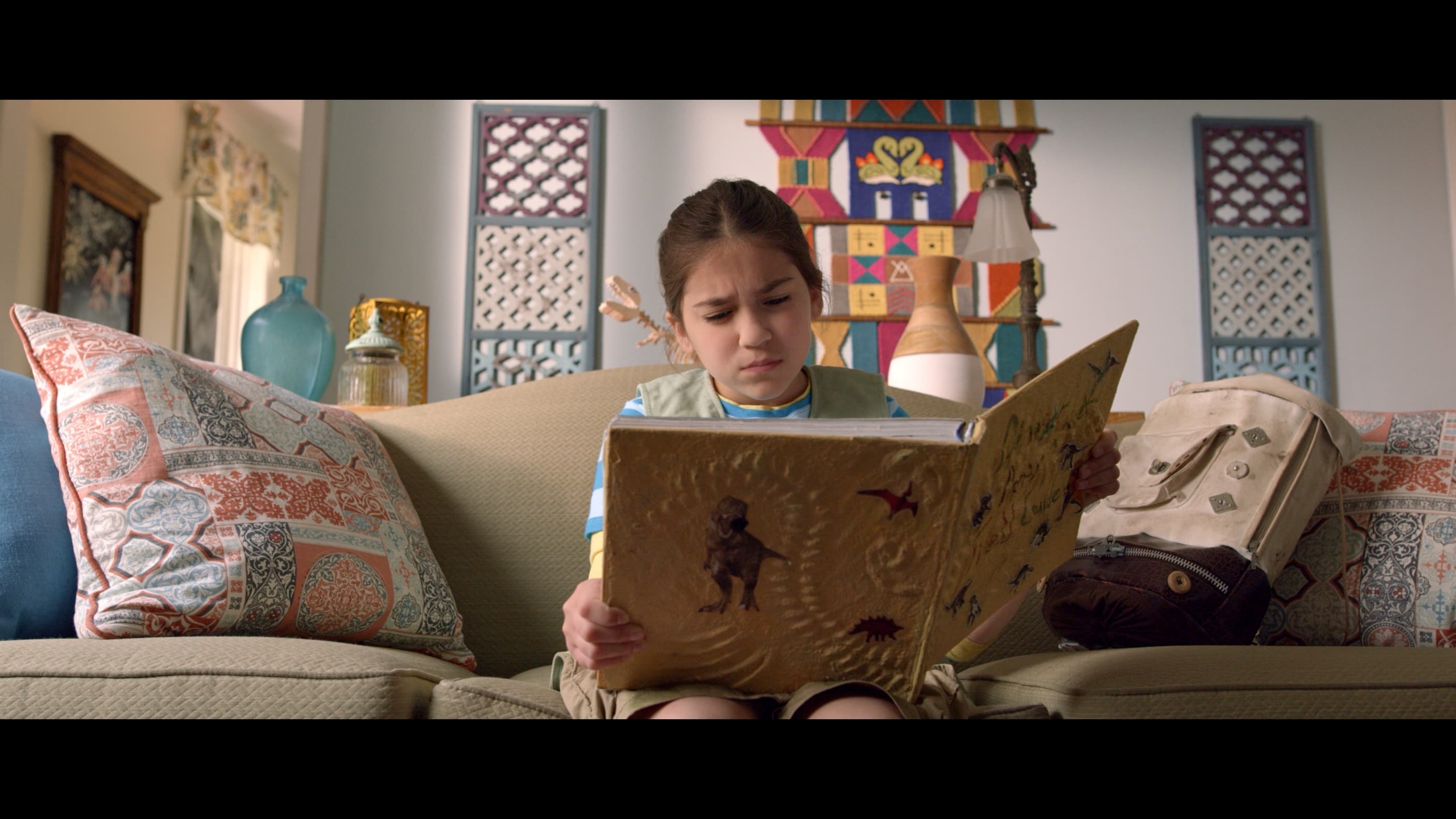 Dana looking at book - 01